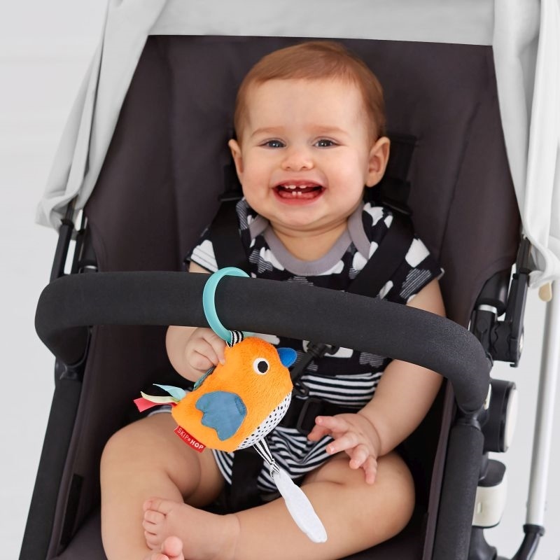 Jucarie cu activitati pentru carucior skip hop vibrant village pasare
