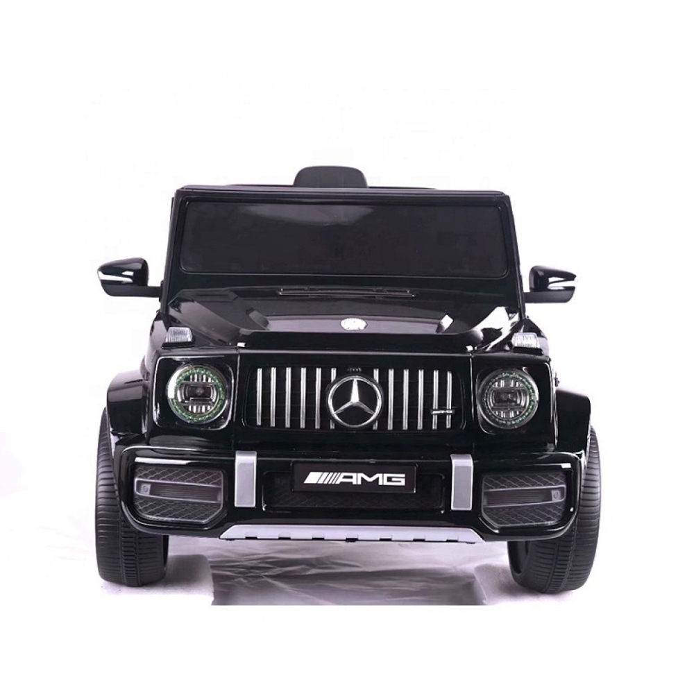 Masinuta electrica pentru copii cu licenta Mercedes Benz AMG G63 Black cu telecomanda 2.4G,2 motoarex30w,Roti EVA,Scaun din piele,Deschidere usi,Lumini LED,Sistem troller,Suspensii,Volan cu functii,Pornire la buton