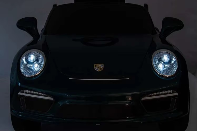 Masinuta electrica pentru copii Porsche RUF CTR3 Police Blue 70w cu licenta,Echipare premium,Roti EVA,Scaun din piele,Oglinzi retrovizoare,Lumini LED,Muzica,BluetoothUSB,Suspensii,Cod QR video asamblare,Afisaj baterie,Eleron