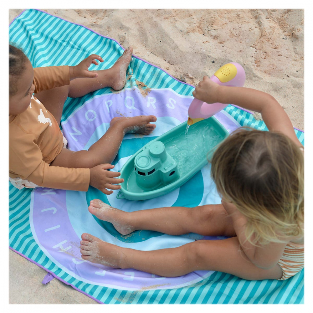 Prosop de plaja cu activitati Quut Toys 140 x 70 cm