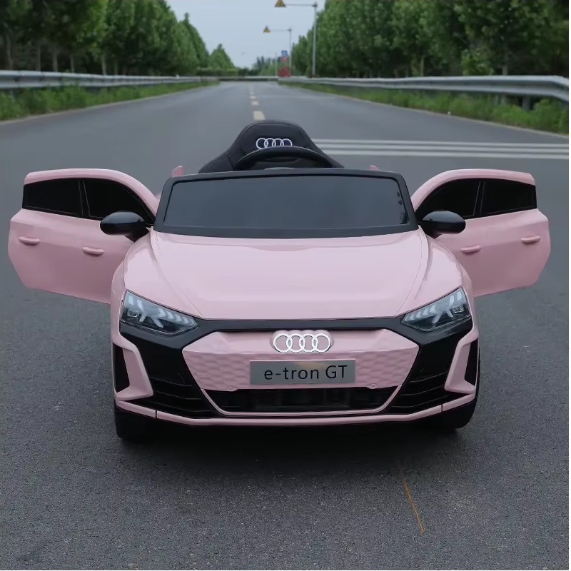 Masinuta electrica pentru copii Audi e-Tron GT Pink cu licenta,radiocomanda 2.4G,roti EVA,doua motoare,acumulator 12V,faruri si stopuri LED,acumulator 12V4,5Ah,doua motoare,oglinzi retrovizoare,unitate audio cu muzica - 1