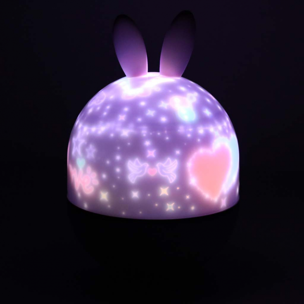 Lampa de veghe pentru copii Rabbit, dimensiune 12 x 16.5 cm, rotativa, cu telecomanda, 6 melodii tematice, lumina led si 6 seturi de folii interschimbabile