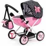 Carucior pliabil pentru papusi Anna Cosy Pinky Heart cu paturica,pernuta si gentuta de umar incluse,roti mari din spuma,cadru metalic bicolor,dimensiune 63x34x58 cm