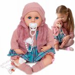 Papusa fetita bebelus Doris Rose 45 cm cu aspect realist si suzeta,corp moale,hainute detasabile, rochita, vesta,botosei si caciulita asortate