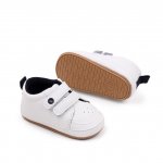 Adidasi albi cu insertii negre Sony 6-9 luni marime 19